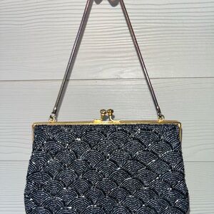Vintage kiss lock handbag